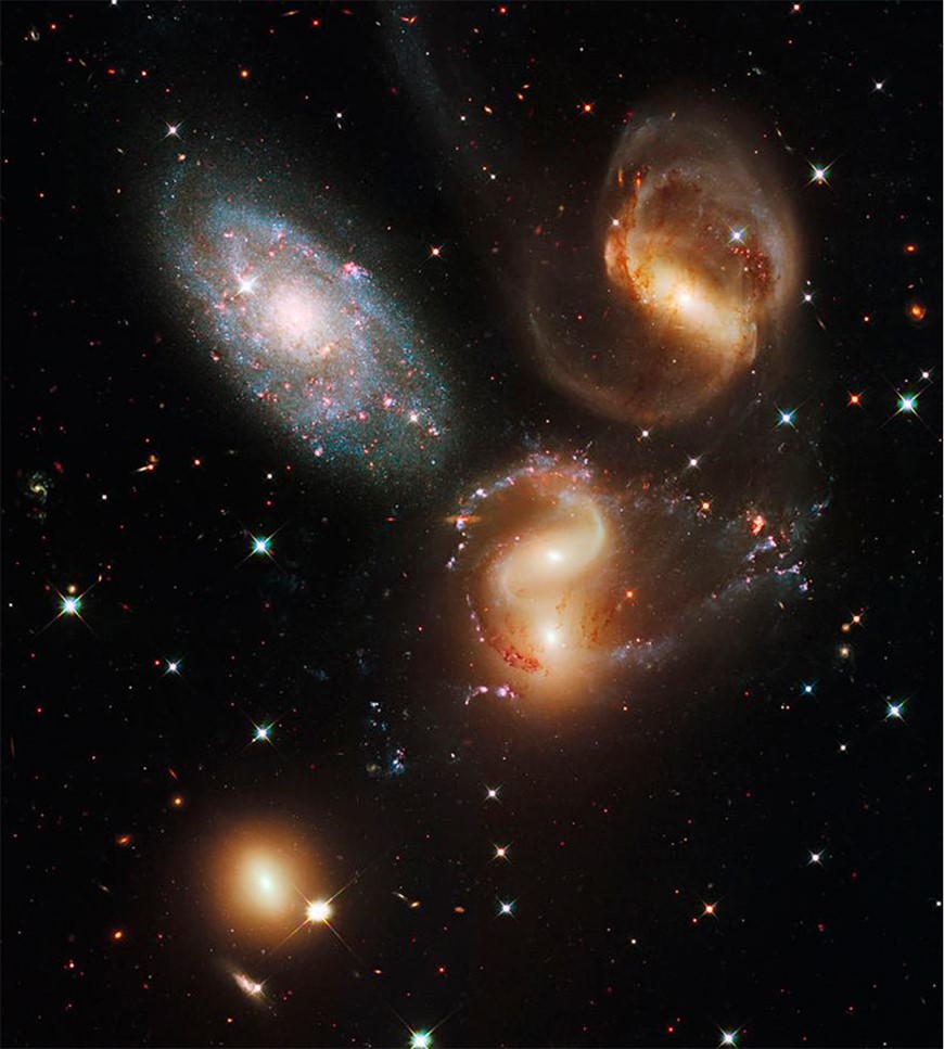 The interior of Stephan's Quintet, pictured by the Hubble Space Telescope. Image Credit: NASA/ESA, Public Domain.